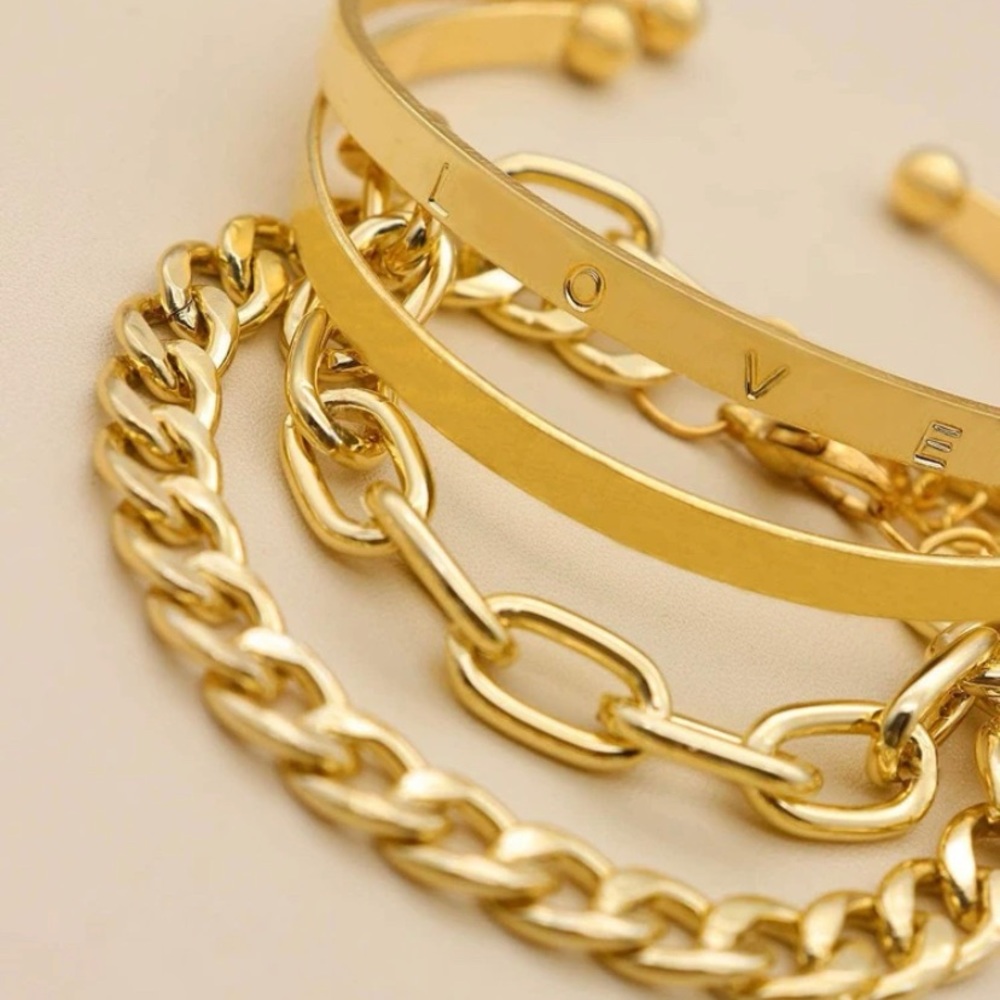 Gold layered bracelets.